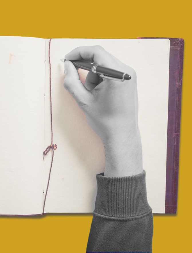 Hand schreibt in Notizbuch.